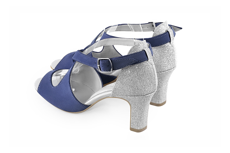 Women's prussian blue and silver elegant sandals closed at the back with crossed straps. Round toe. High kitten heels - Rear view